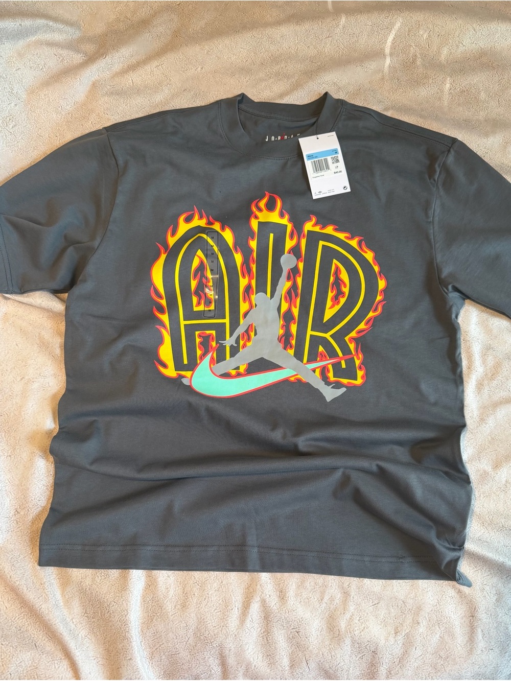 Jordan Black Tee with Yellow-Orange Flame AIR Graphic and Teal Jumpman